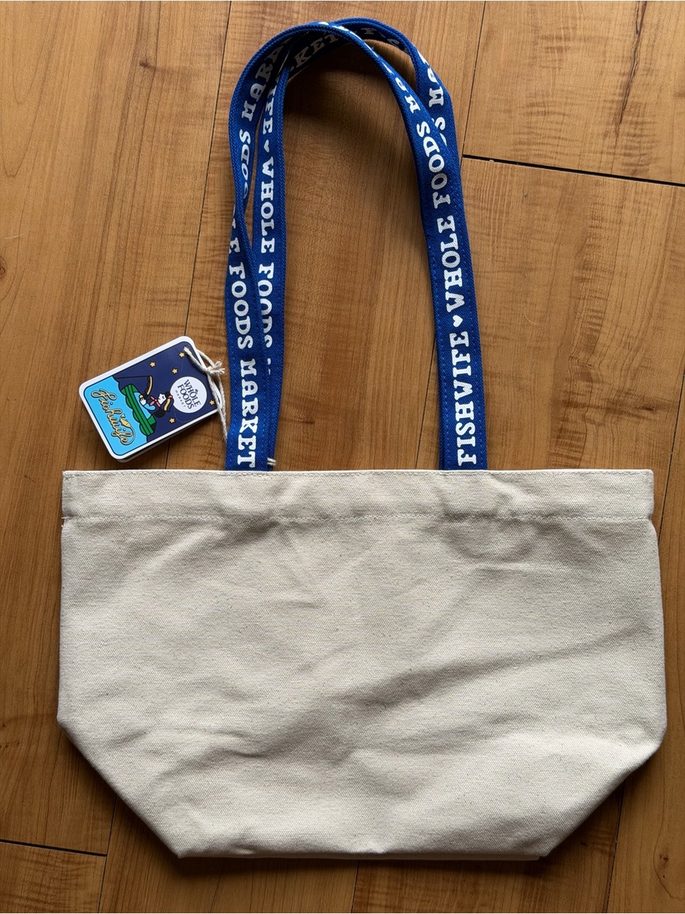 Whole Foods Market Fishwife Canvas Tote Bag in Natural with Blue Handles - Picture 4 of 11